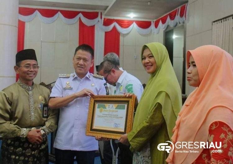 Pj Bupati Kampar Beri Santunan, Sempena HUT Baznas ke-23