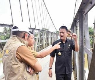 Pj Bupati Kampar Hambali Intruksikan Perbaiki Jembatan Gantung Desa Gobah