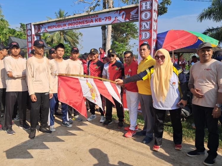 Polsek Pangean Gelar Gerak Jalan Santai untuk Memeriahkan HUT RI ke-79