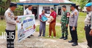 Polsek Pangean dan Media Patrolikriminal86.com Gelar Jumat Barokah Di Desa Padang Tanggung